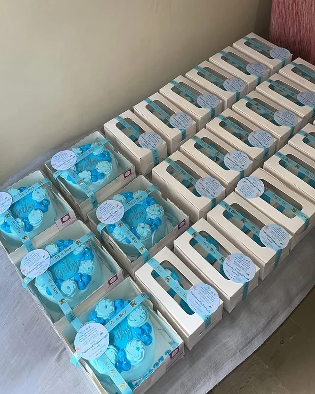Large bulk order package featuring multiple celebration cakes and cupcakes for newborn baby Murtuza Malik with blue theme - Bulk Cake Orders in Karachi By Whisk And Sift